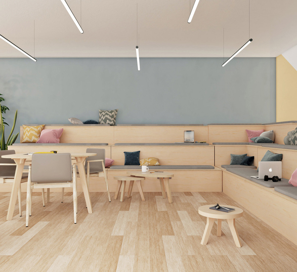 un espace informel en entreprise avec table ronde, tables basses et estrades en bois