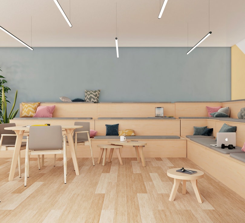 espace collaboratif avec avec du mobilier collaboratif en bois type estrade et tables