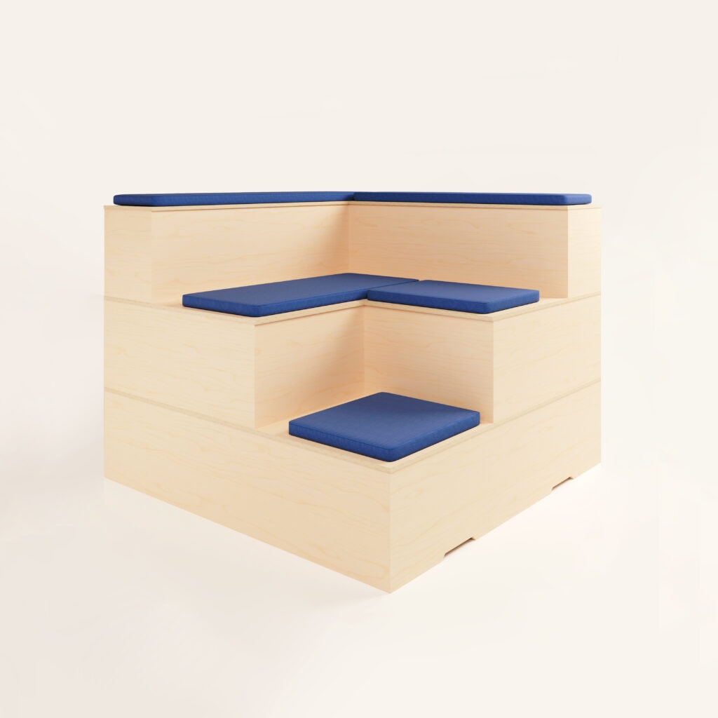 estrade modulable d’angle en bois avec un niveau et des coussins bleus