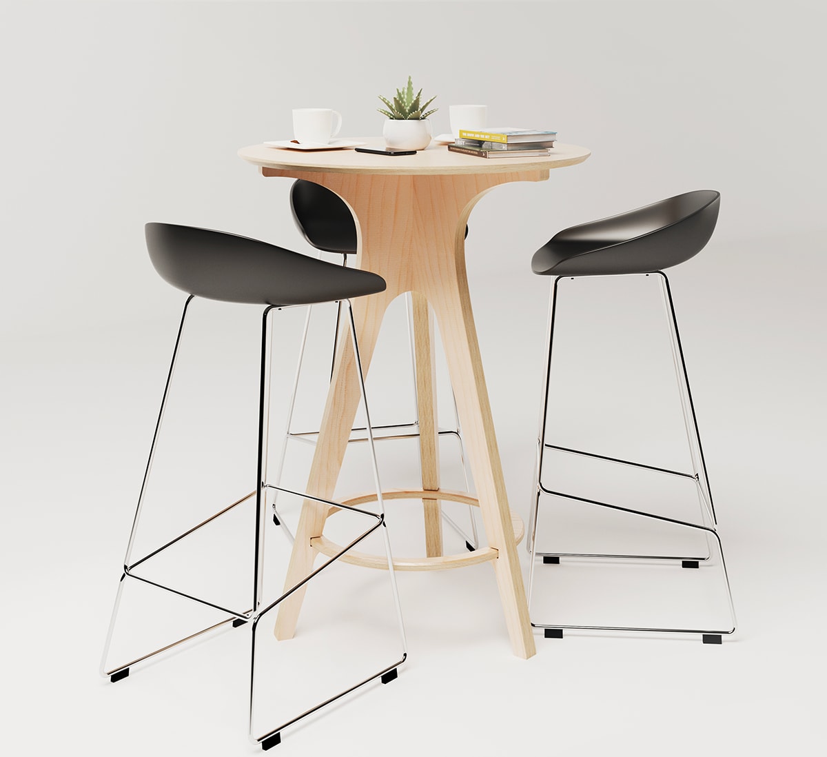table ronde haute en bois avec une plante, tasse à café et trois chaises hautes noires